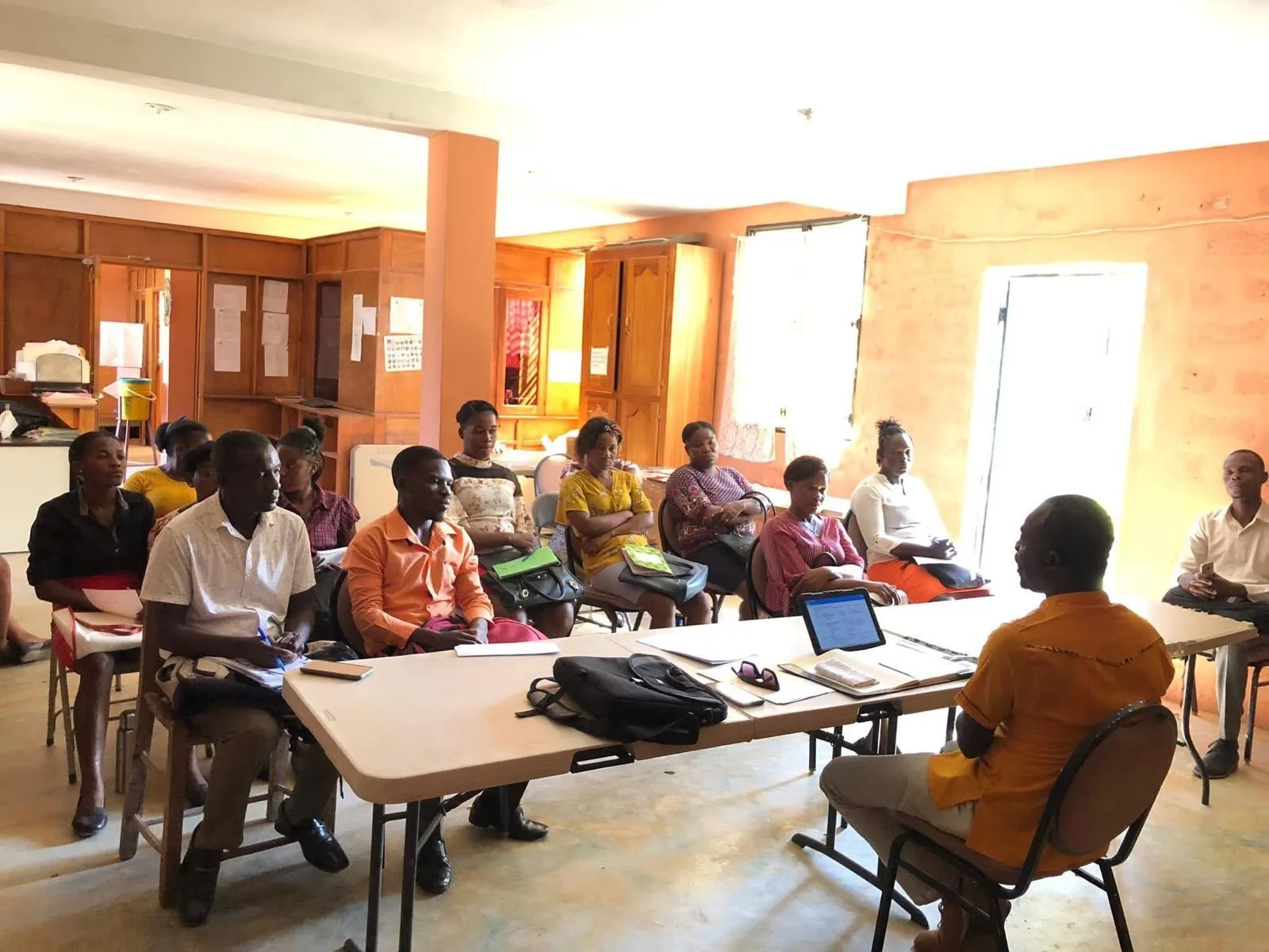 A House of Hope trainer leads a mental health workshop for a room of local educators and leaders
